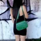 green leather bag with hearts